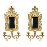 Pair of Napoleon III wall sconces in gilded bronze, with bevelled mirrors.