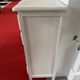 Patinated wooden chest of drawers