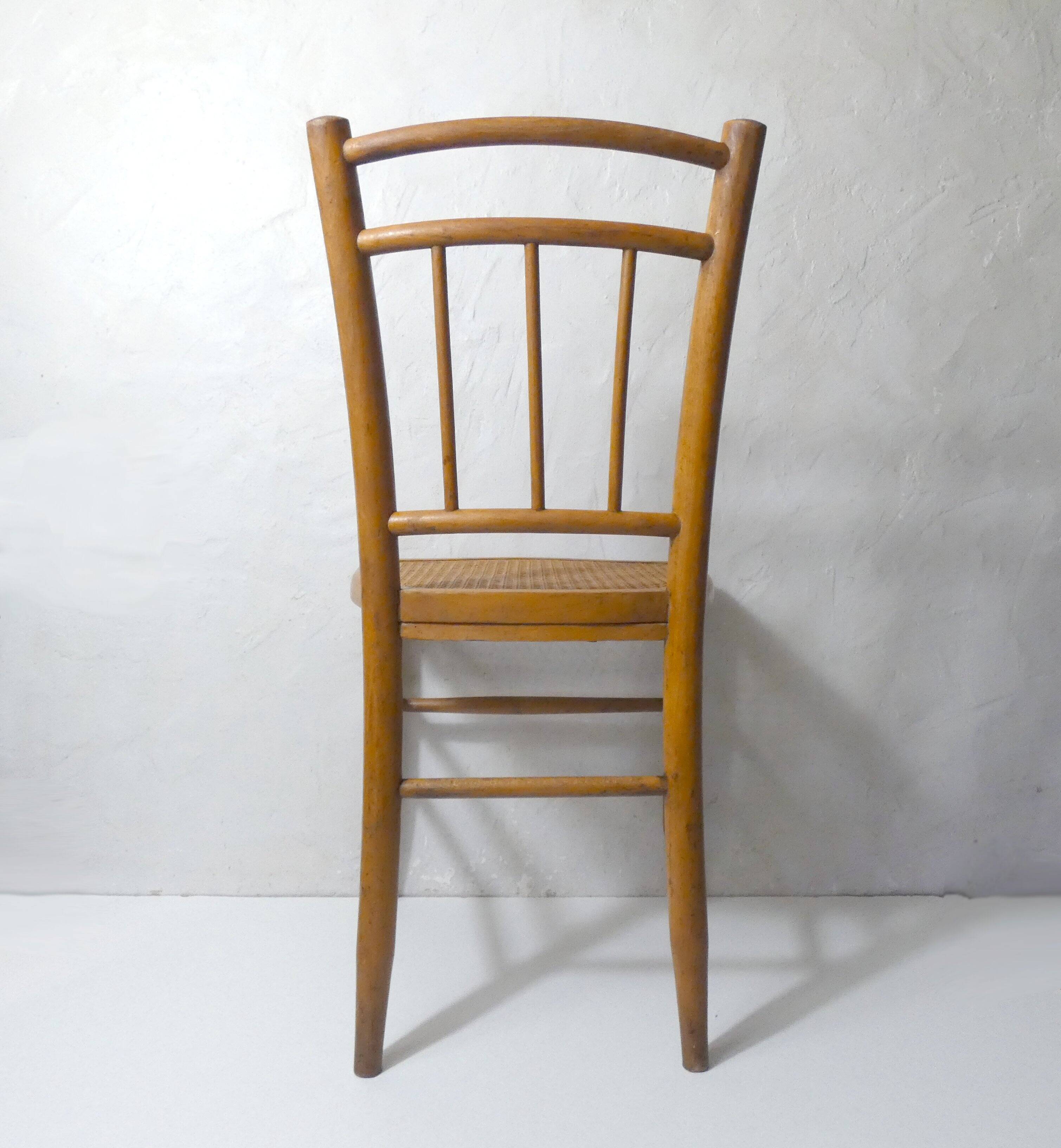 vintage wooden bistro chair with caning
