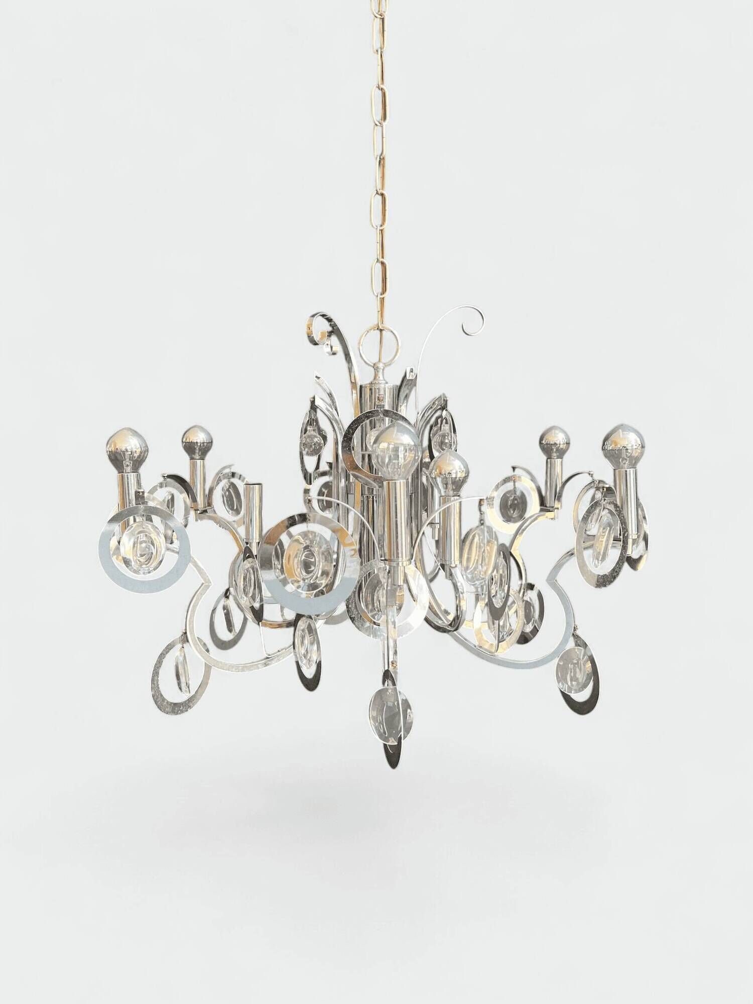 Chrome Metal Design with Swirls and Optical Glass Lenses. Tra