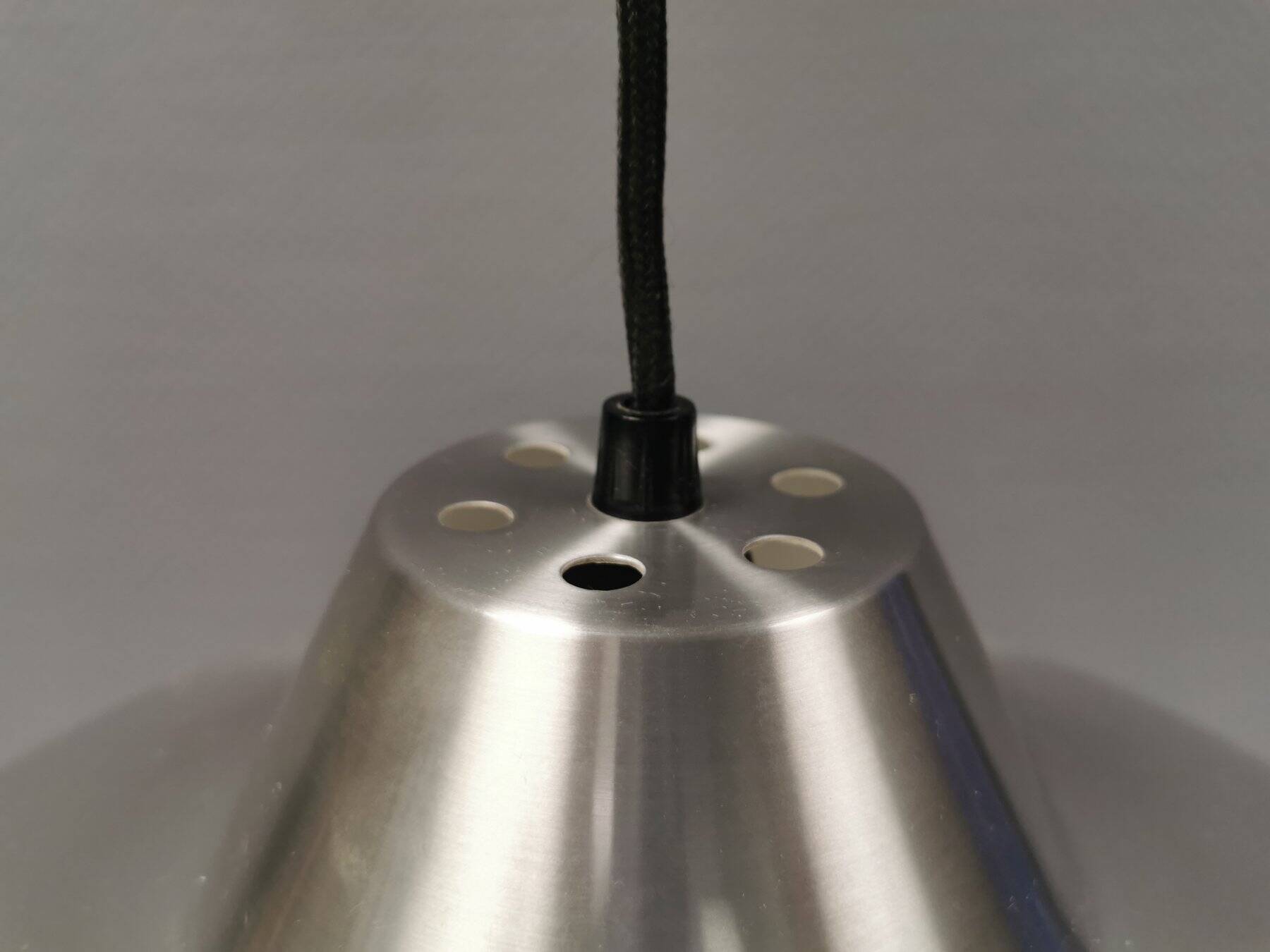 Slim silver-colored hanging lamp with a large diameter. Denmark 1980s