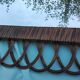 Oval mirror in rattan