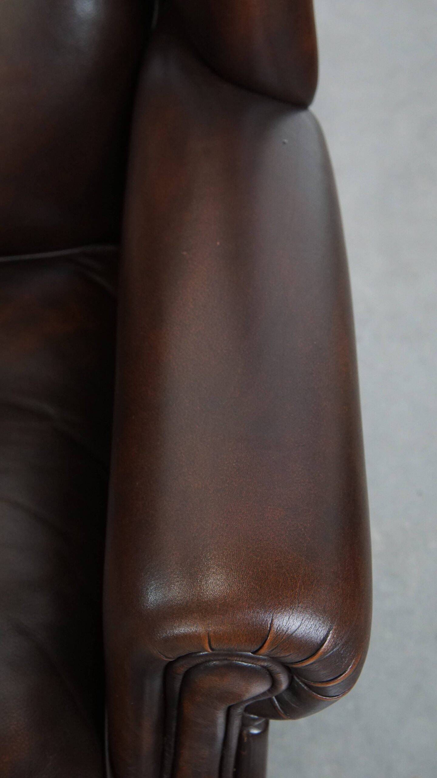 Comfortable and very beautiful set of 2 cow leather wingback armchairs in English style