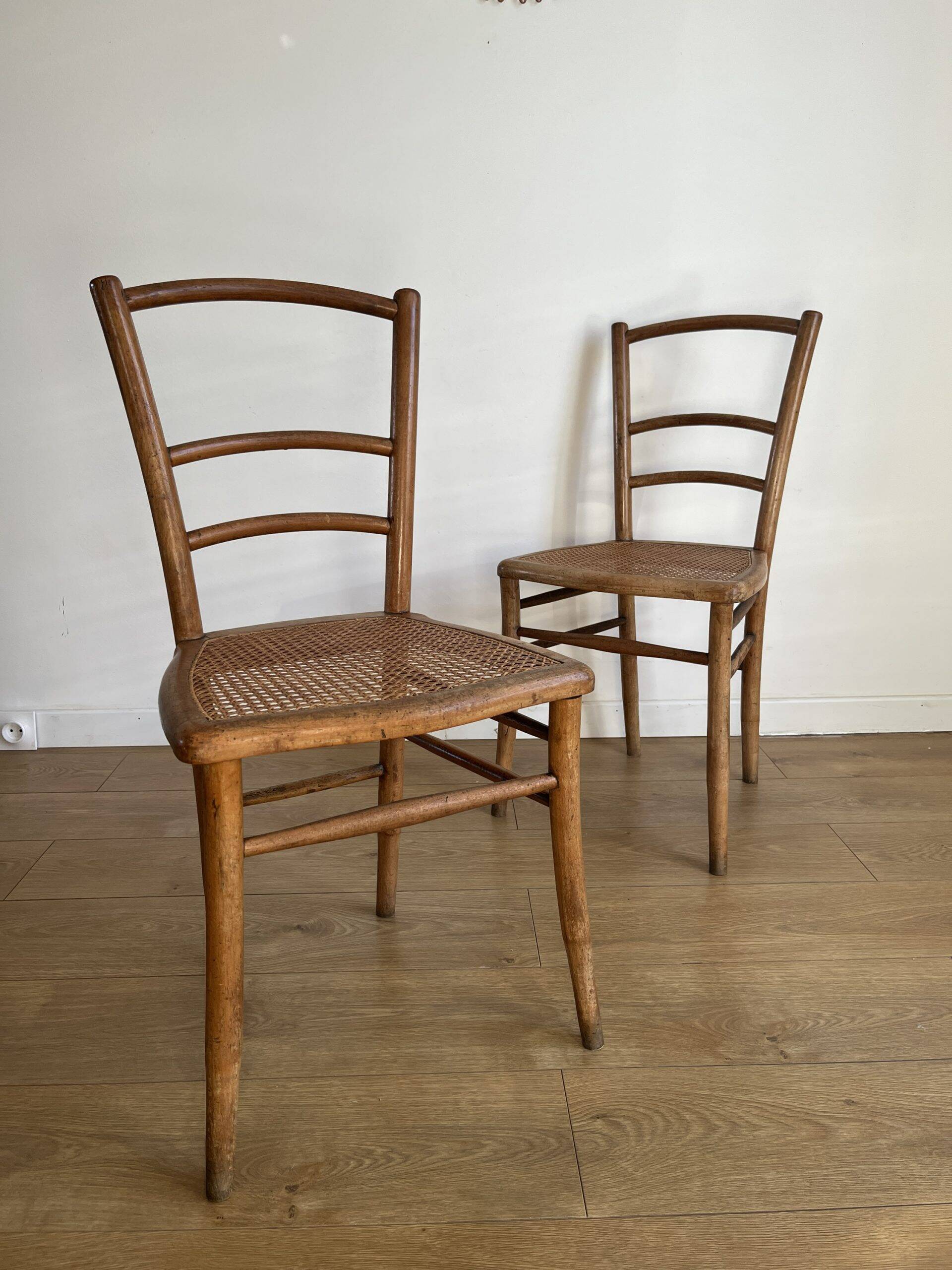Pair of caned bistro chairs