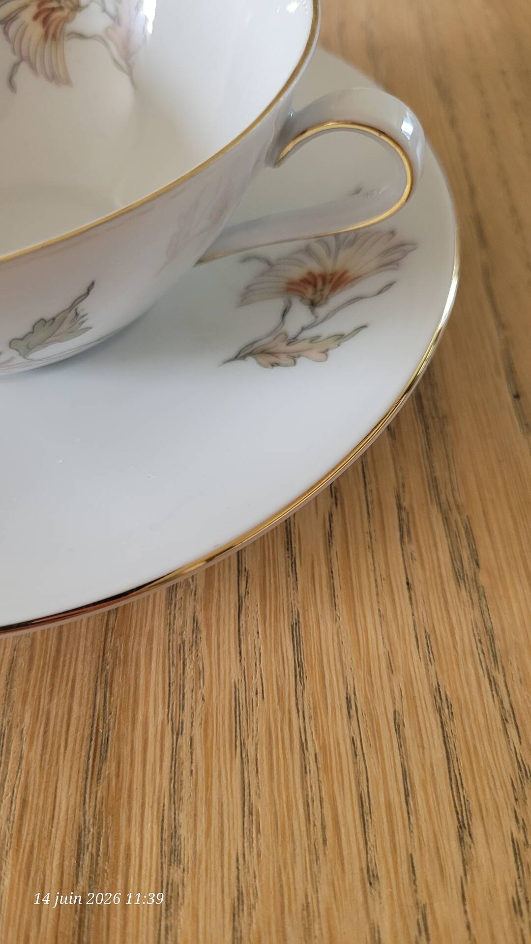 2 large antique cups and their saucers