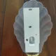 Pair of Art Deco shell wall sconces in frosted glass and brass.