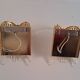 Pair of gold metal wall lights with tassels