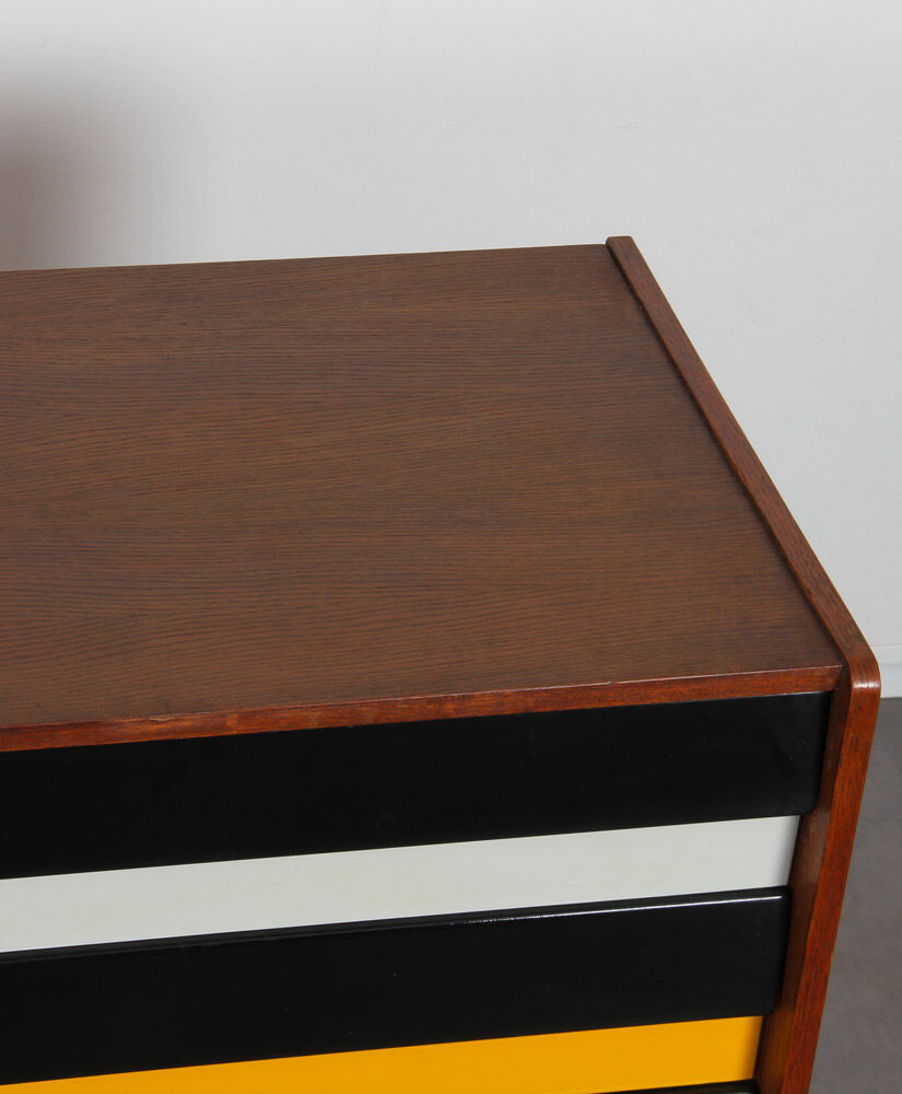 Oak sirdeboard with yellow and black drawers by Jiri Jiroutek, 1960
