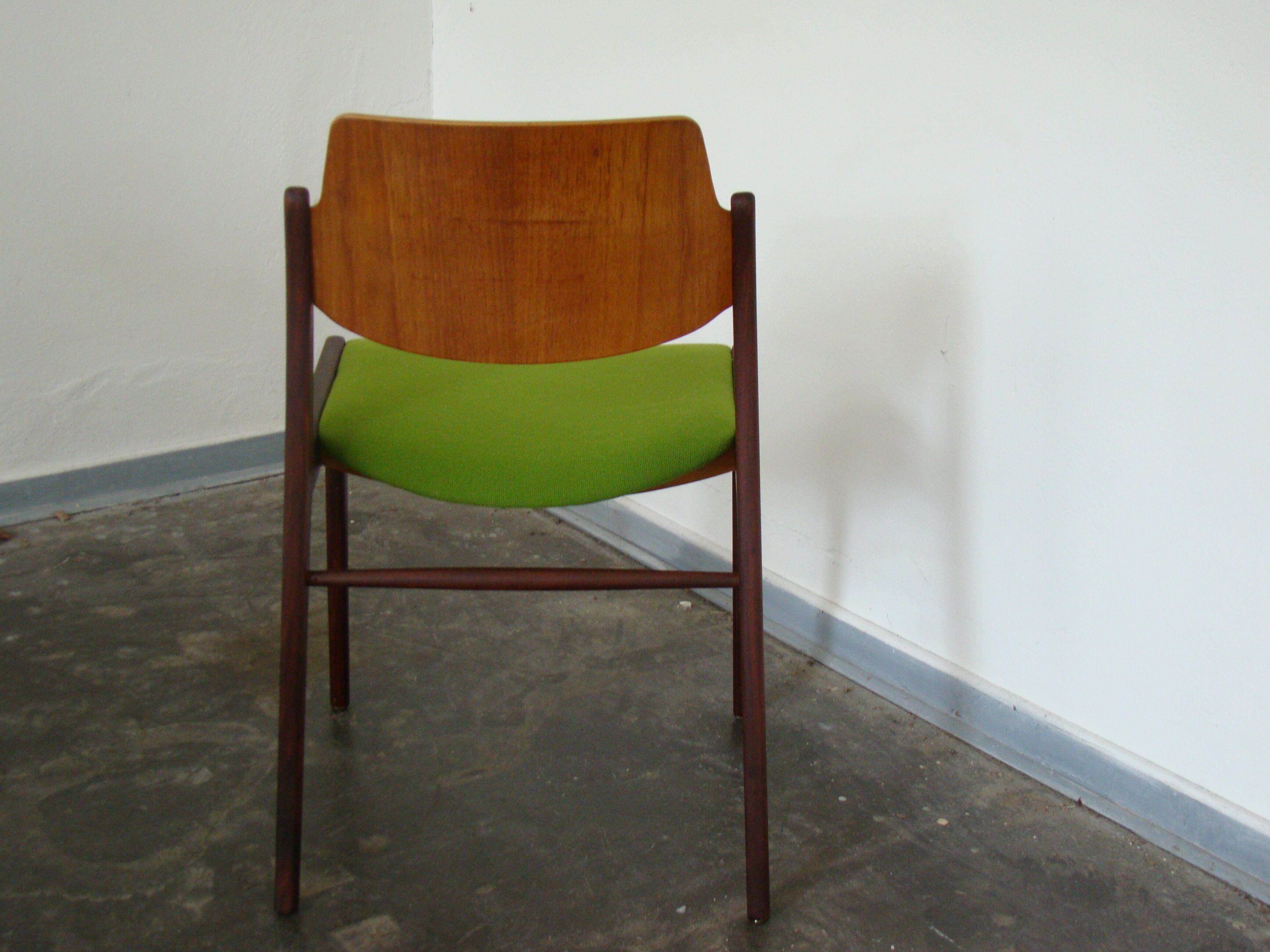 Two vintage teak dining chairs