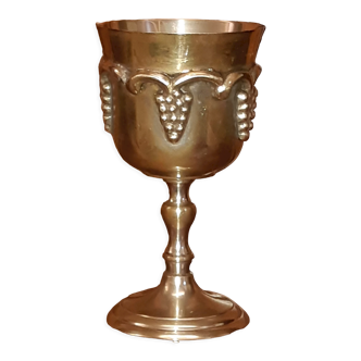 Wine chalice cup in silver bronze decoration of grapes in relief