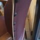 Skai chair binds wine and wooden footpieces and armrests