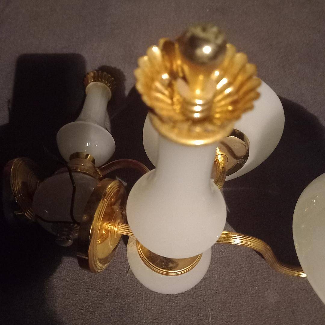 brass and white opaline wall lights