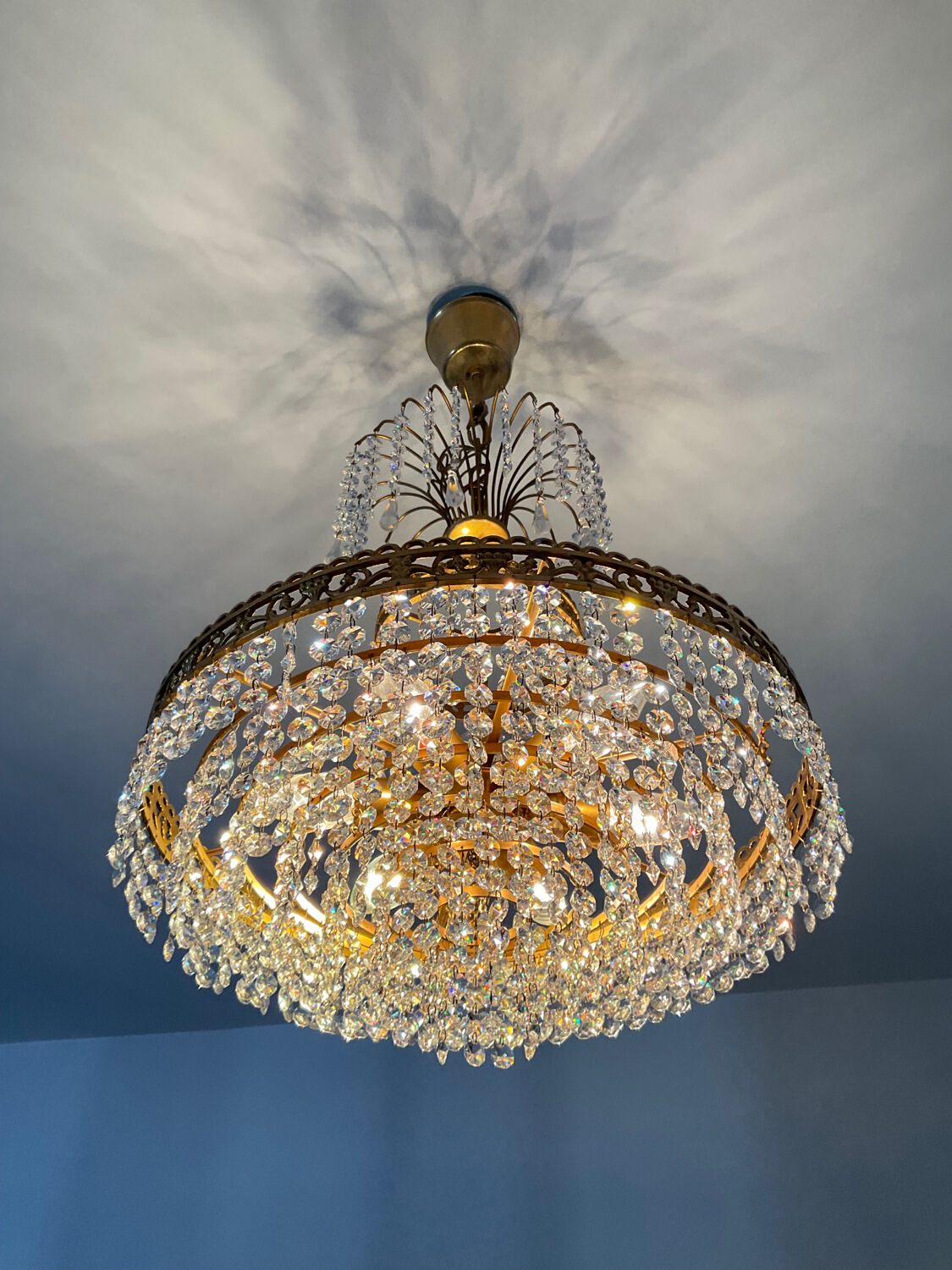 Cascade chandelier with crystal and bronze tassels