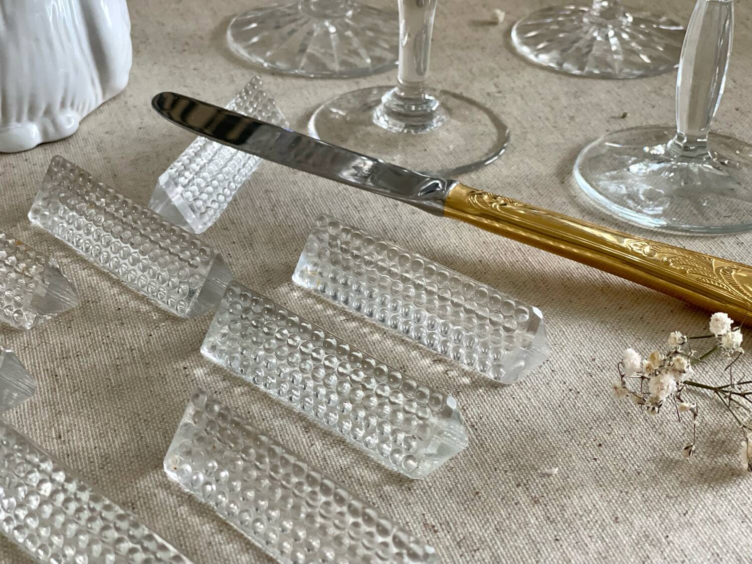 12 glass knife holders.