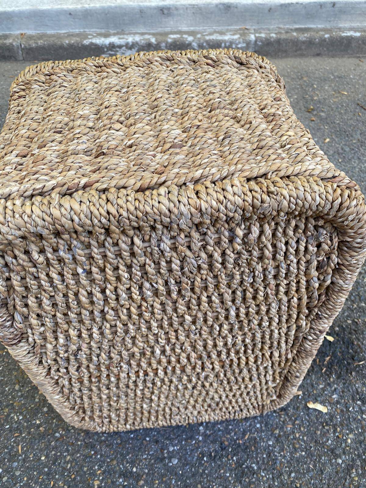 Large basket / rectangular storage bin made of woven natural fibre.