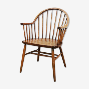 Wooden armchair with bars