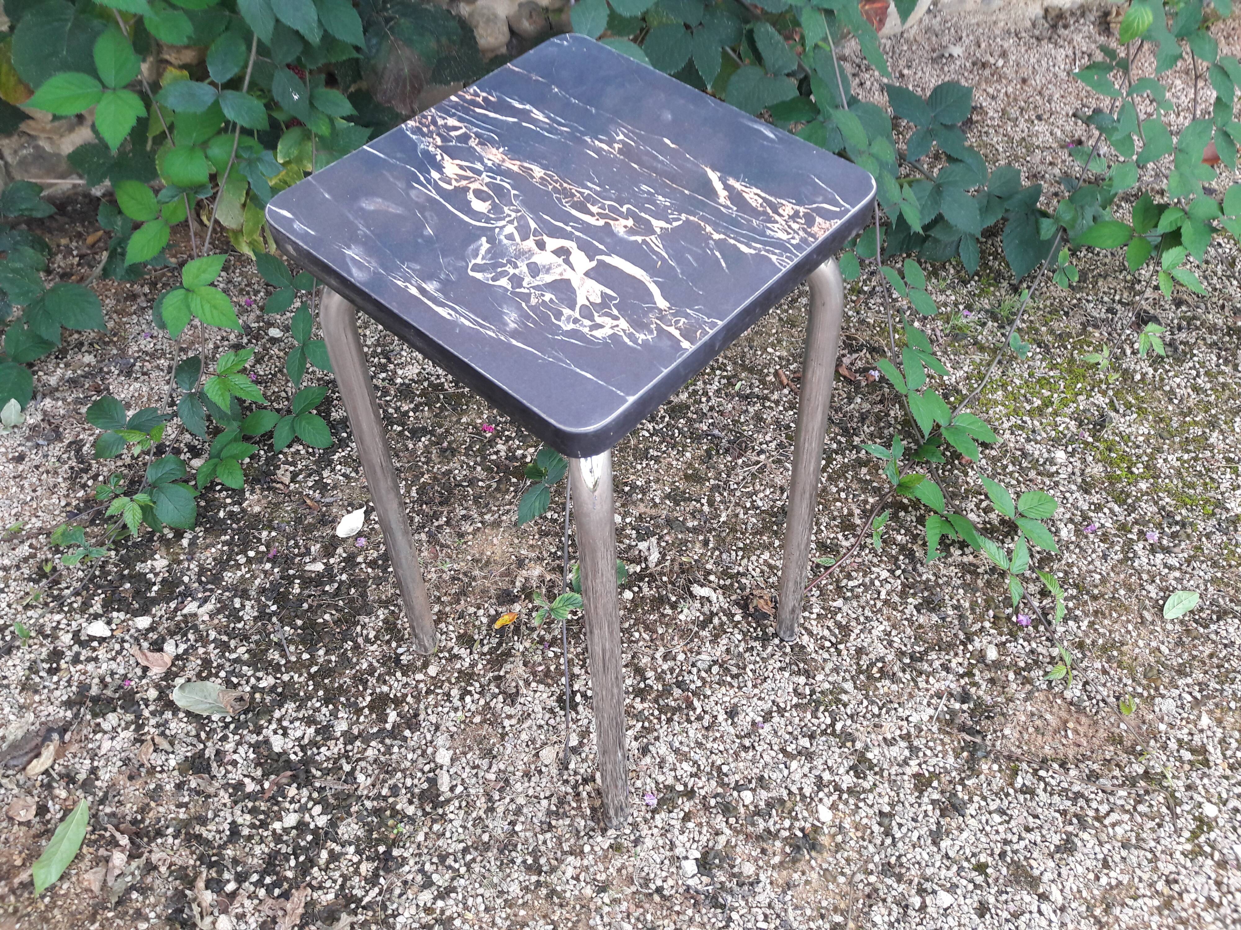 High stool in marbled black formica