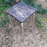 High stool in marbled black formica