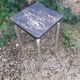 Tabouret haut en formica noir marbré