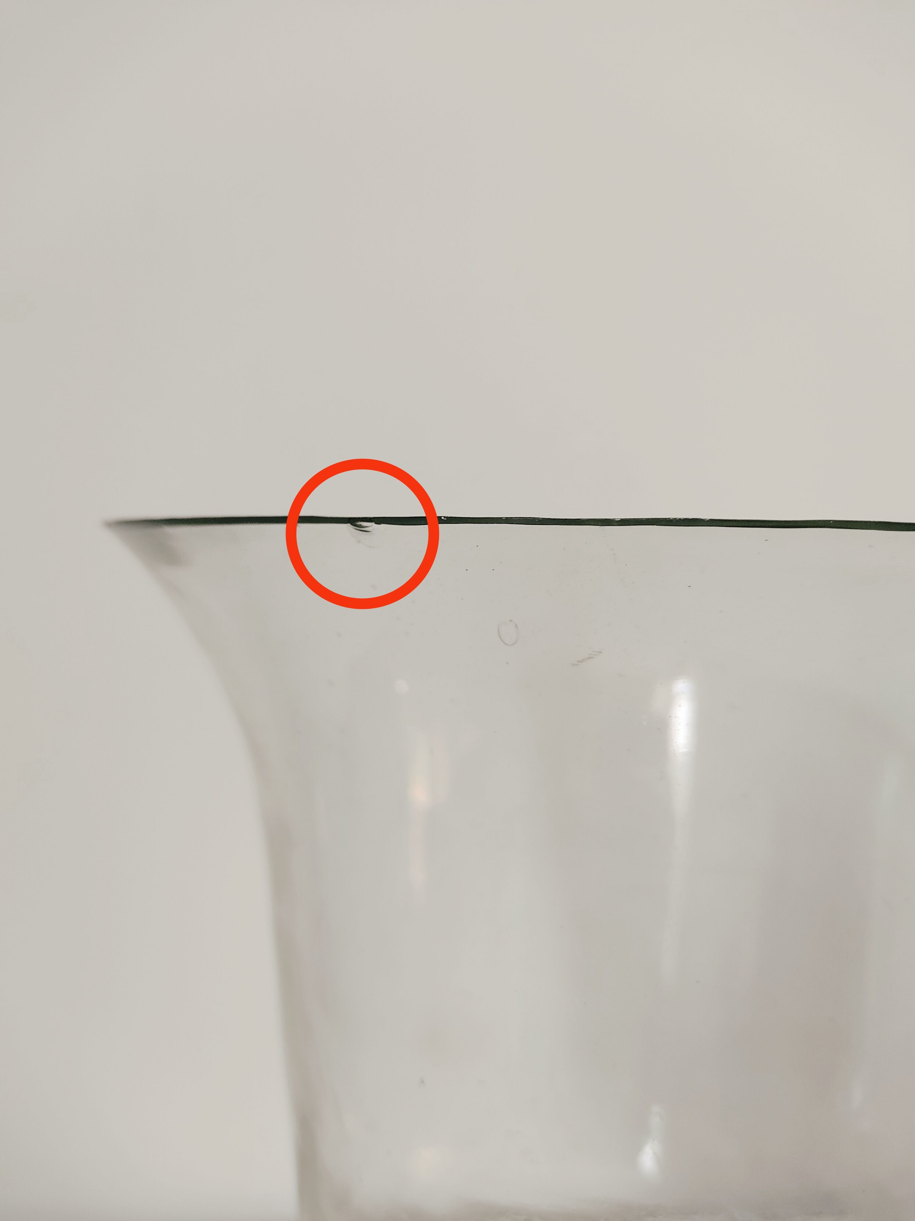 Metal foot glass vase