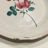 Eastern earthenware plate decorated bouquet of flowers