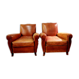 Pair of armchairs with club leather mustache