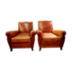 Paire de fauteuils a moustache club cuir