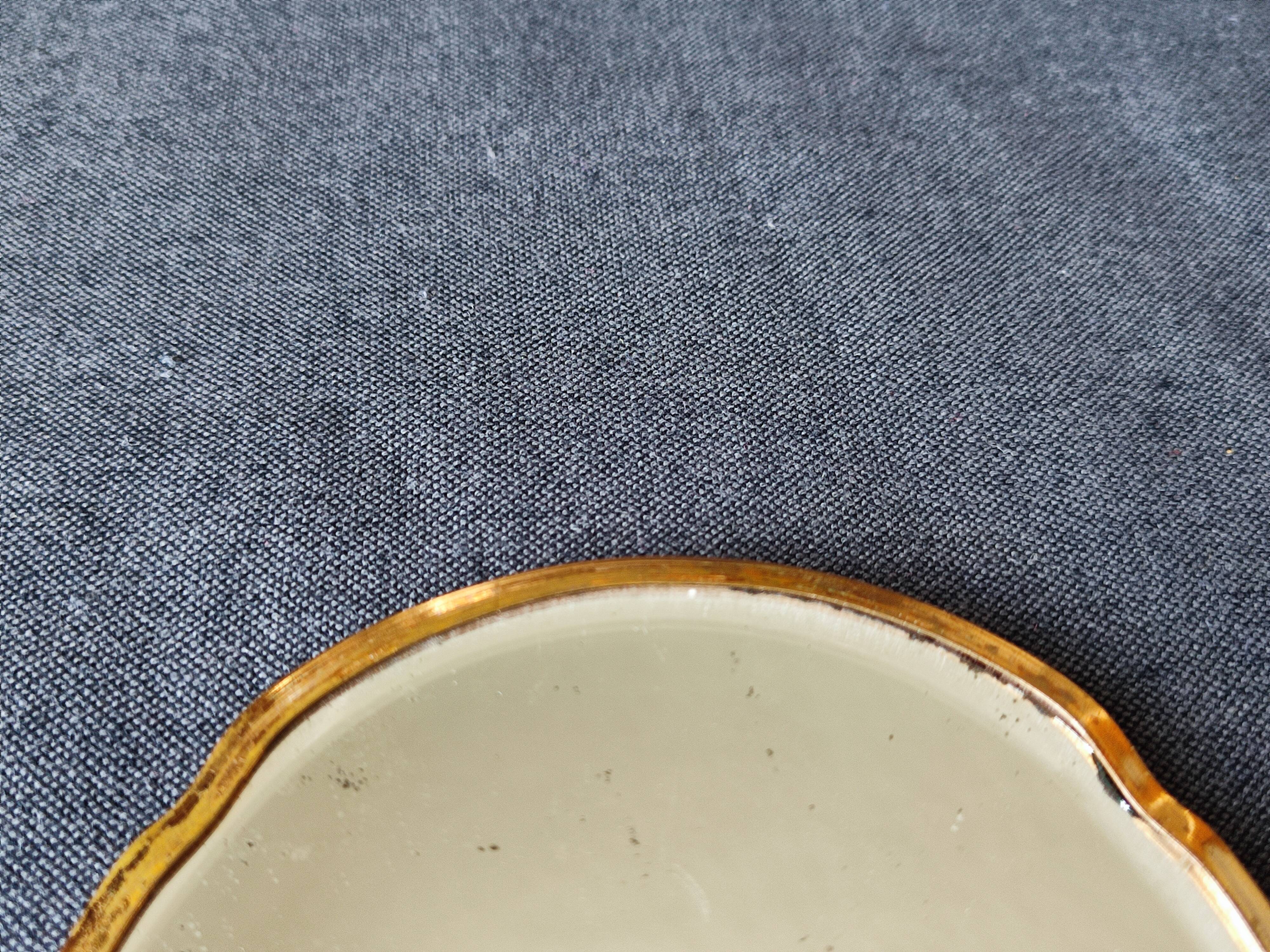 Miroir a main biseauté de taille moyenne art deco