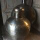 Pair of polished metal water flasks from Rajasthan.