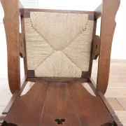 Pair of low Brutalist oak lounge chairs with new rush seats – circa 1935