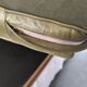 Fauteuil Chesterfield en cuir vert olive