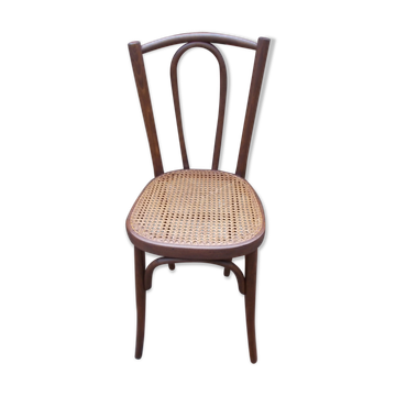 Curved wooden bistro chair with caning