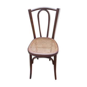 Curved wooden bistro chair and canning