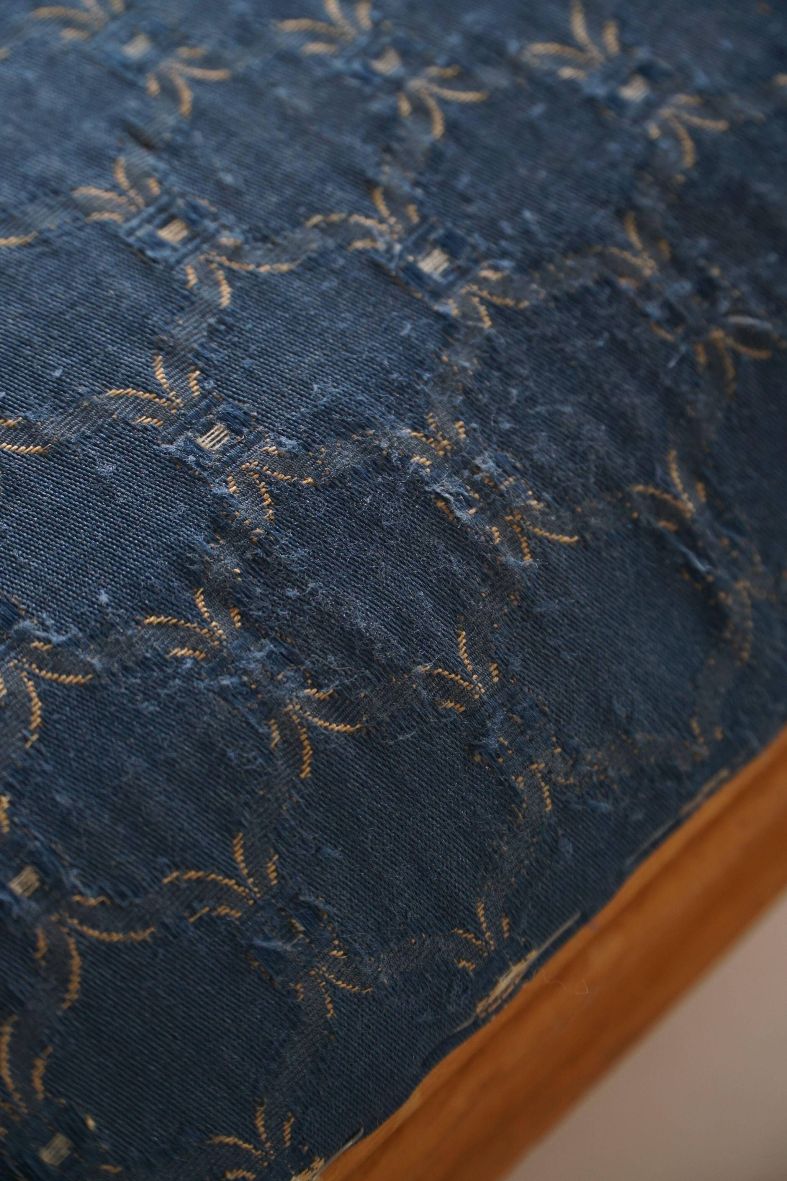 French Art Deco low stool with vintage upholstery made in the 1940s.