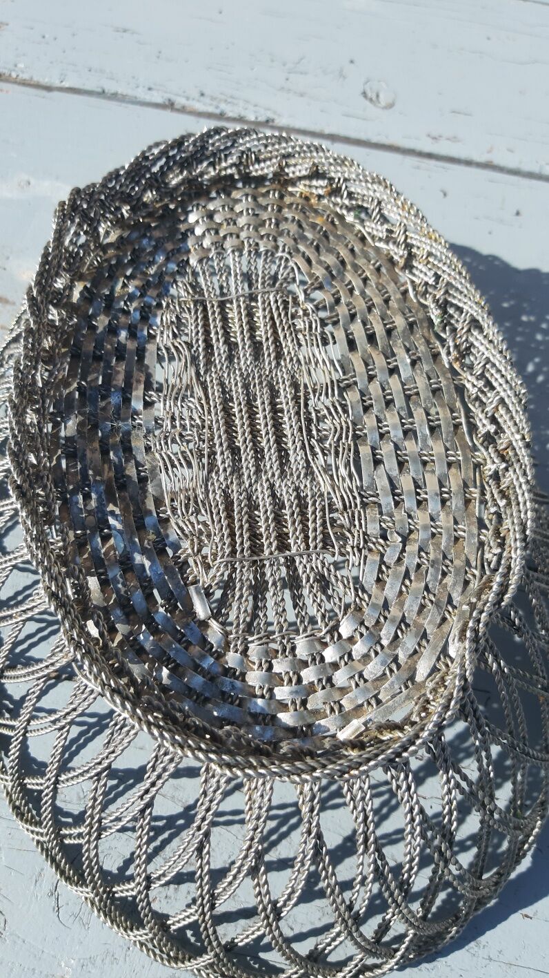 flat basket cut center table in woven metal