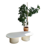 oblong coffee table on 2 fluted bases in light beige