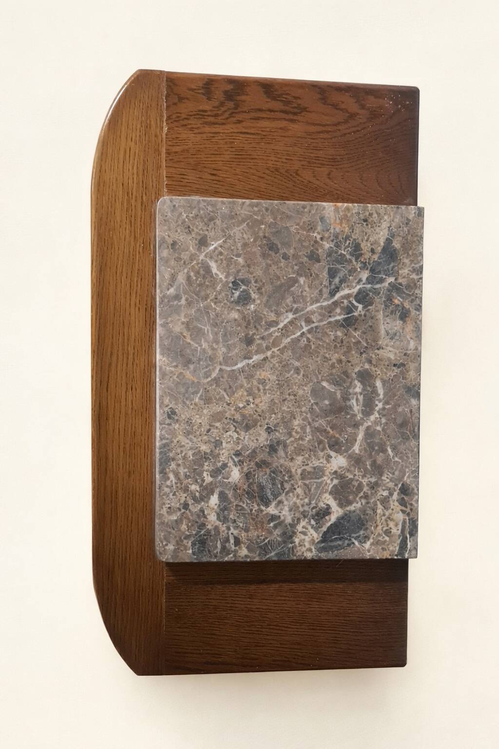 Small vintage 1950s wooden buffet with marble top and tapered legs.