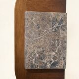 Small vintage 1950s wooden buffet with marble top and tapered legs.