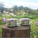 Vintage sandstone cups with flowers