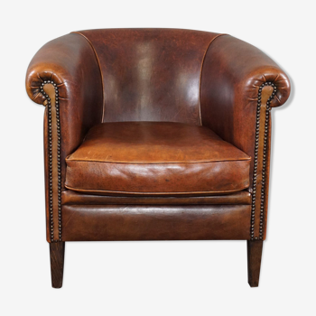 Club chair in sheepskin with a relaxed sitting position