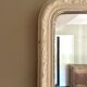 Antique Louis-Philippe mirror with pearls and shells, white patina.
