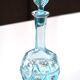 Turquoise blue glass decanter, golden décor, 5O years