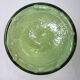 Bouteille vintage en verre bullé vert