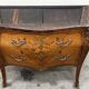 Commode galbée et marquetée style Louis XV