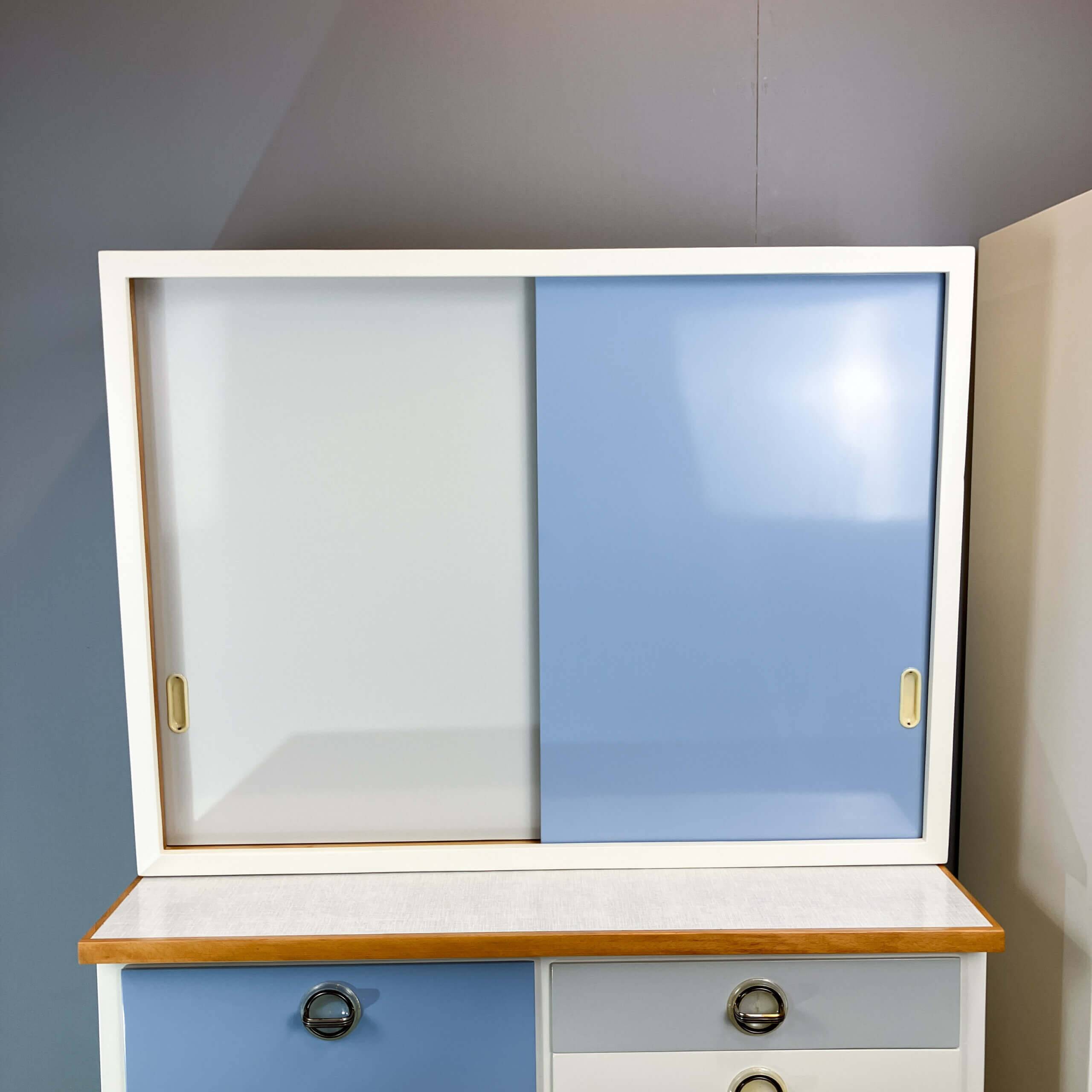 Kitchen cabinets, pastel blue and light gray, vintage from the 60s
