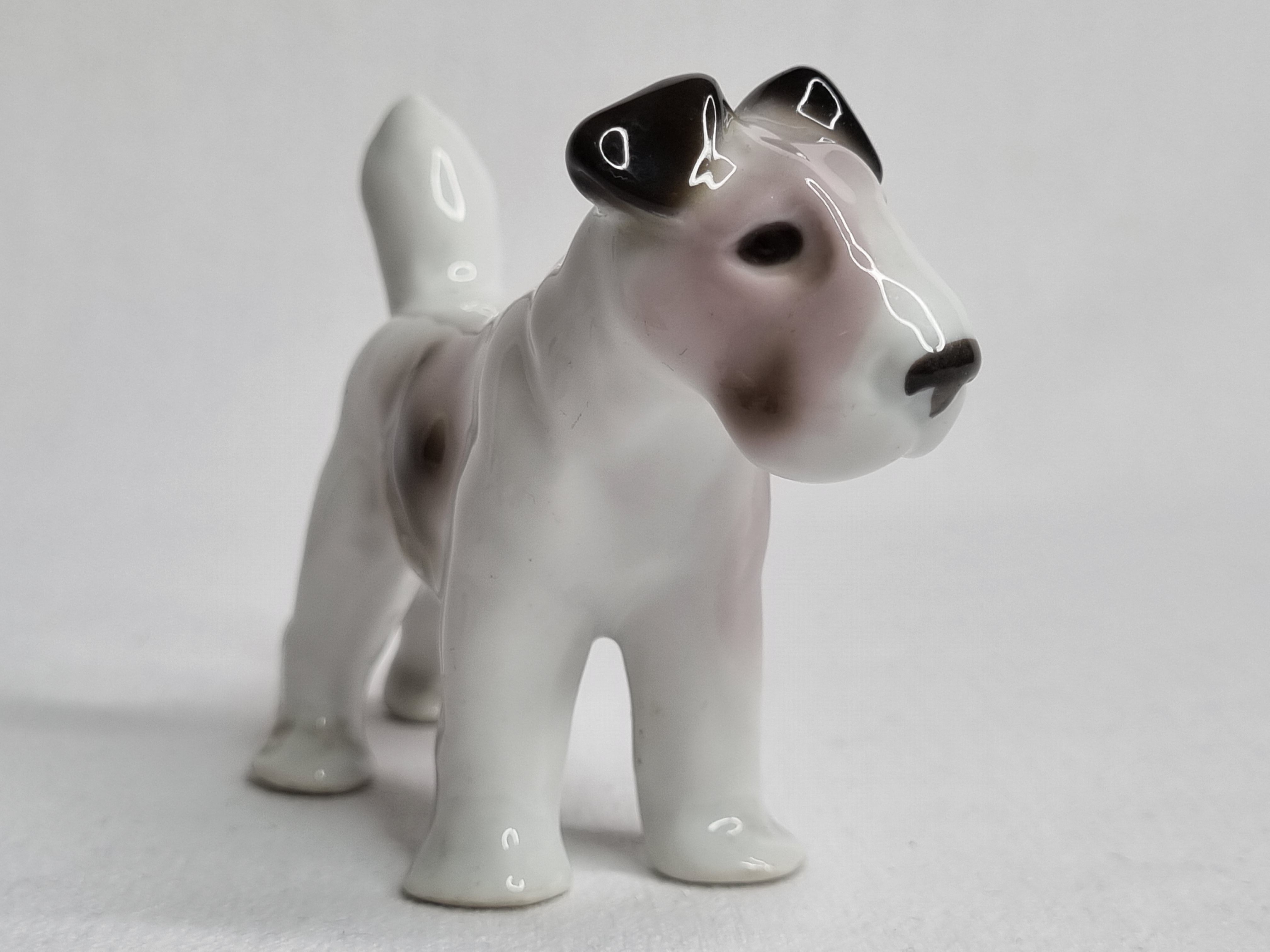Set of three porcelain puppies