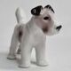 Set of three porcelain puppies