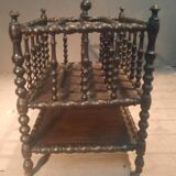 Rosewood magazine rack on casters