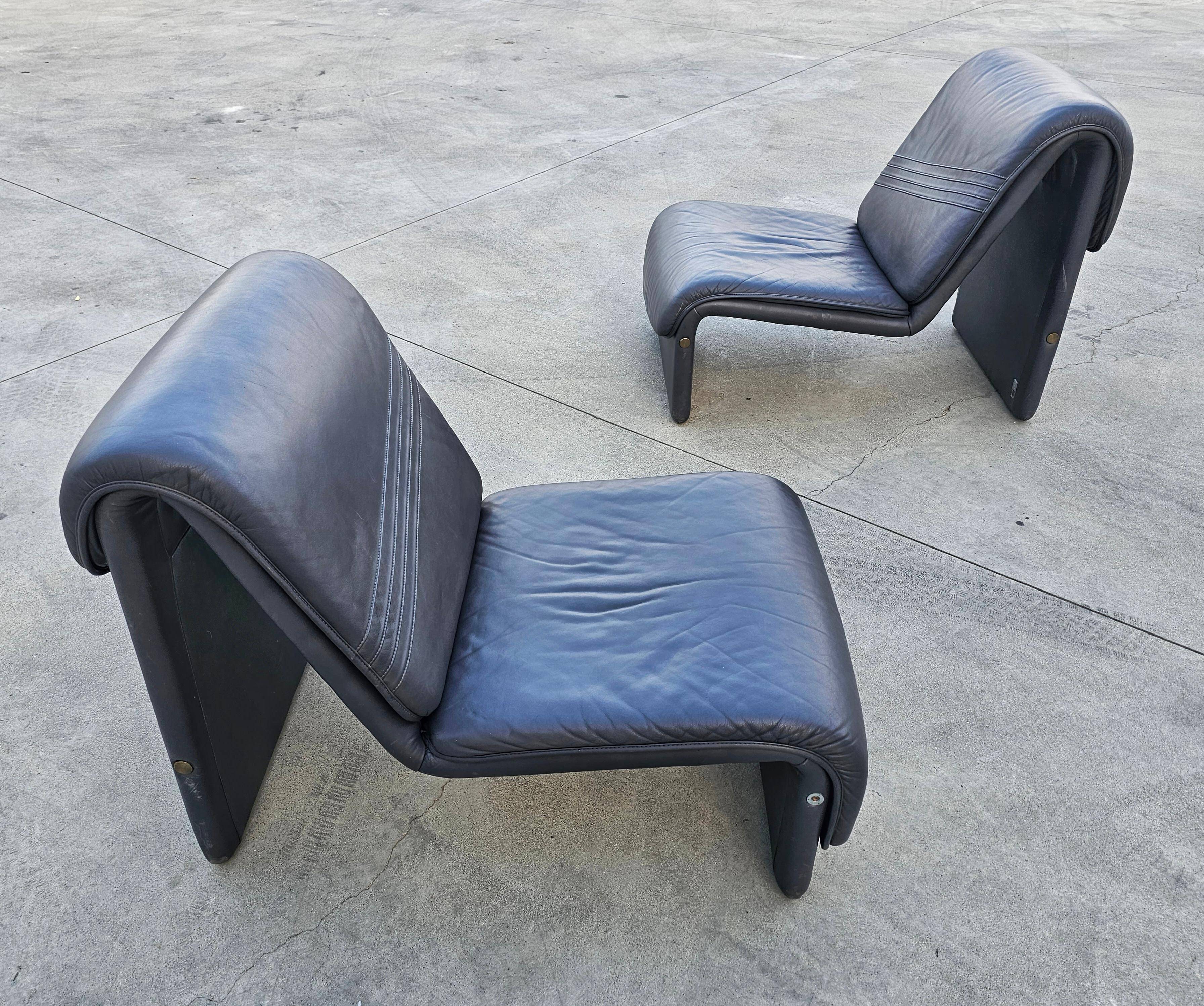 Postmodern leather lounge chairs in the style of Etienne Fermigier 1978.