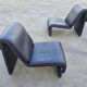 Postmodern leather lounge chairs in the style of Etienne Fermigier 1978.